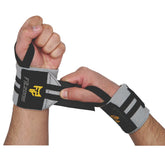 Hand wearing grey wrist support strap with Fitzone logo on a white background in Pakistan