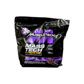 A sealed package of MuscleTech Mass Tech Extreme 2000 weight gainer supplement in triple chocolate brownie flavor. The package is predominantly black with purple and white accents and displays the product name, weight, and flavor.