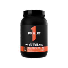 Black container of Rule 1 Whey Isolate protein powder on a white background in Pakistan