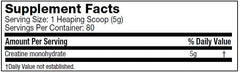 Supplement facts label with creatine monohydrate content on a black background